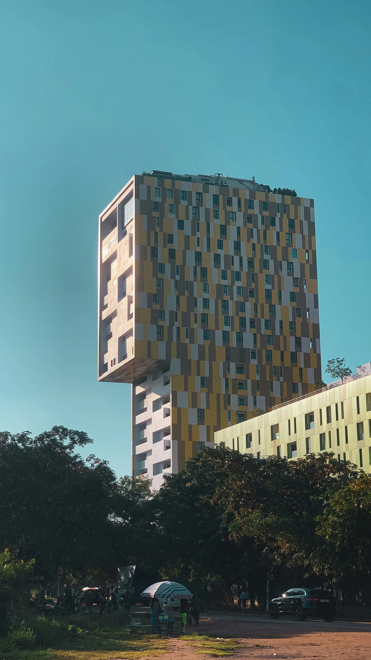 A tall building that has a lot of windows on it.