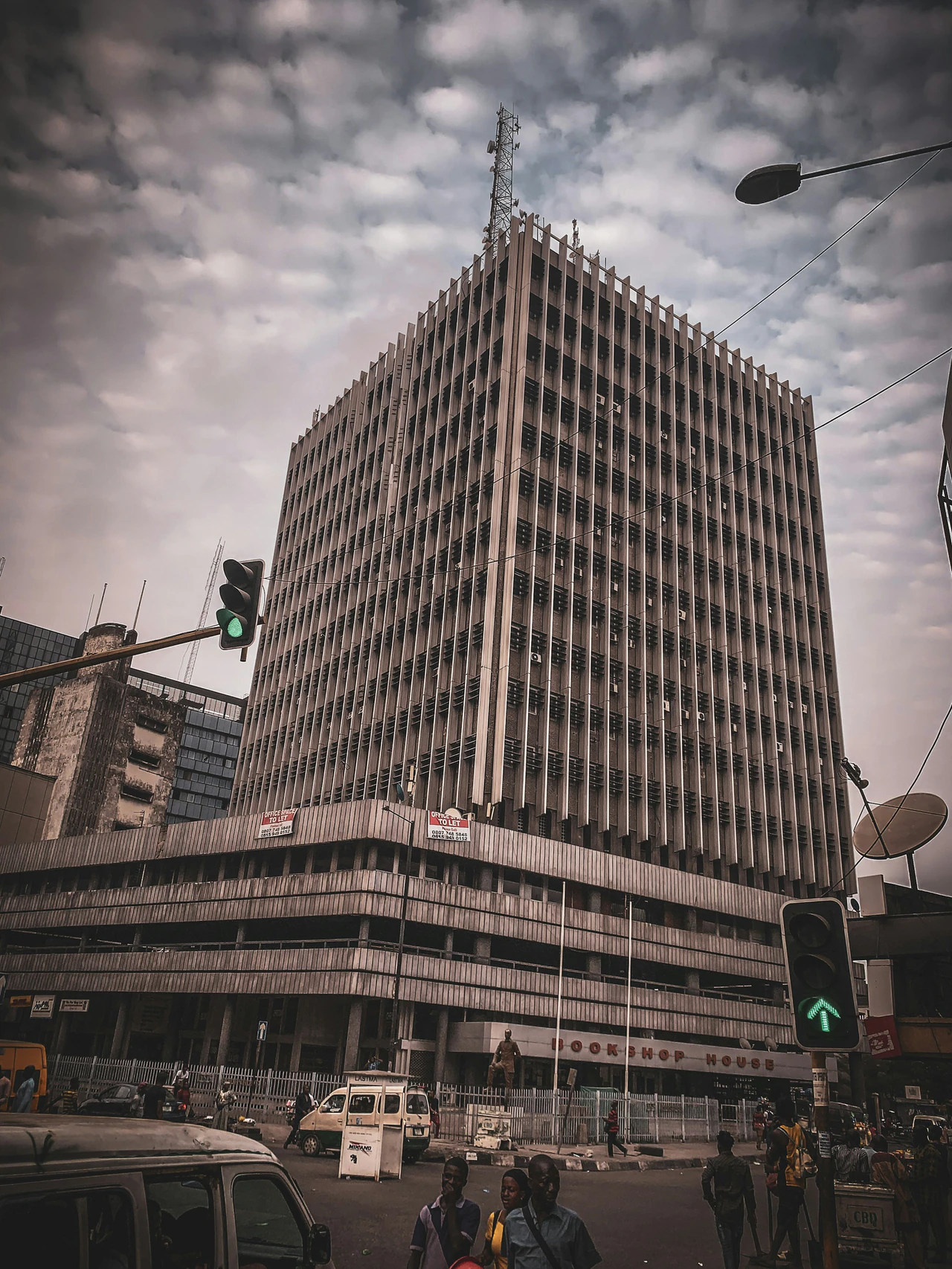 A tall building with a bridge.